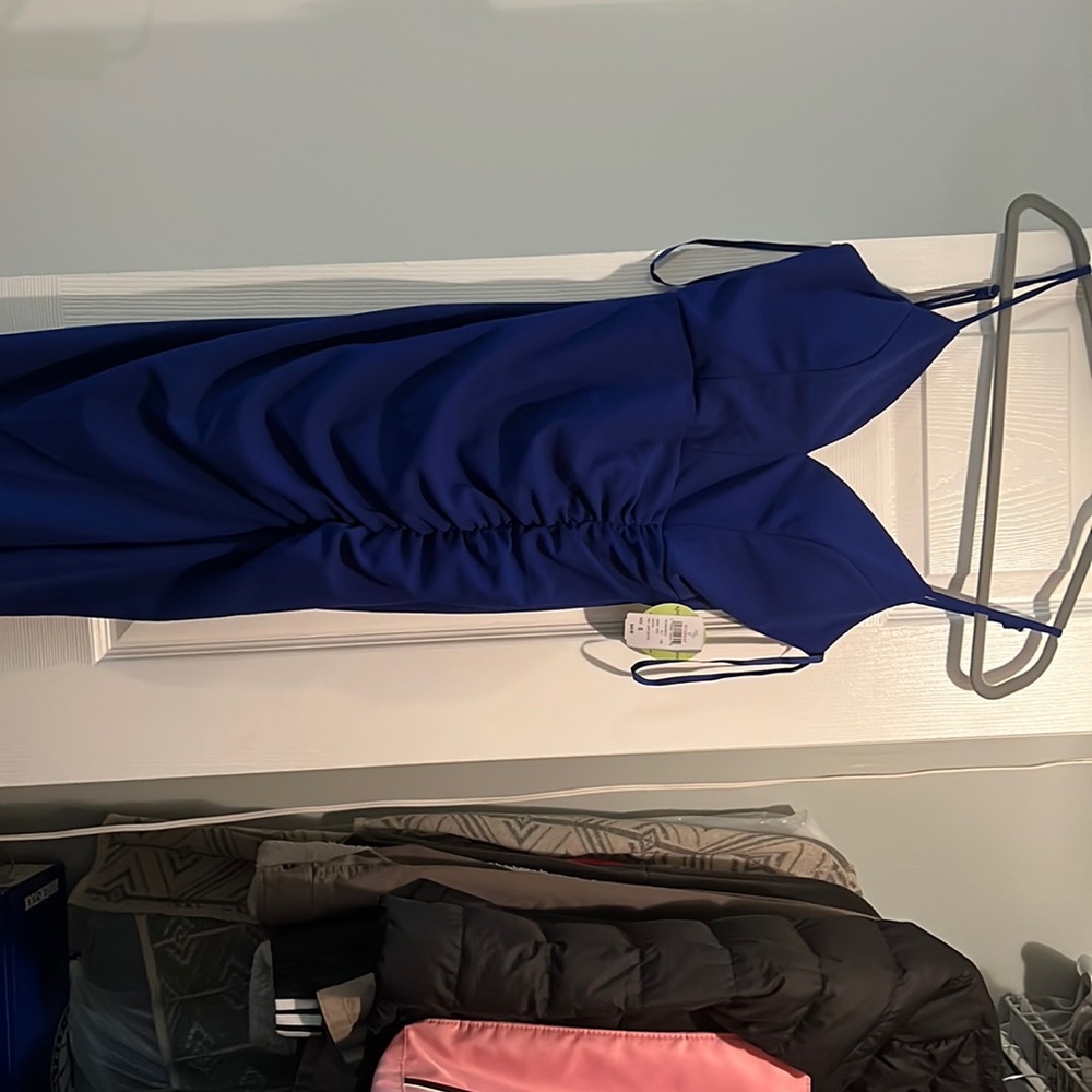 Selling bc it was a backup prom dress, never worn, from Windsor size S